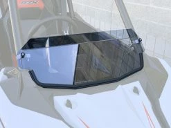 UTVZilla Polaris RZR RS1 Hard Coated Polycarbonate Half Windshield W/ Billet Clamps